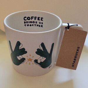 Starbucks White Mug with Green Hand Design